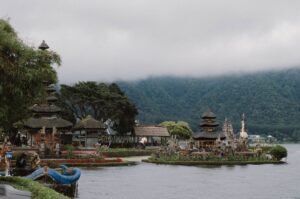 Scenic view of the Ulun Danu Beratan Temple surrounded by nature and lake in Bali.